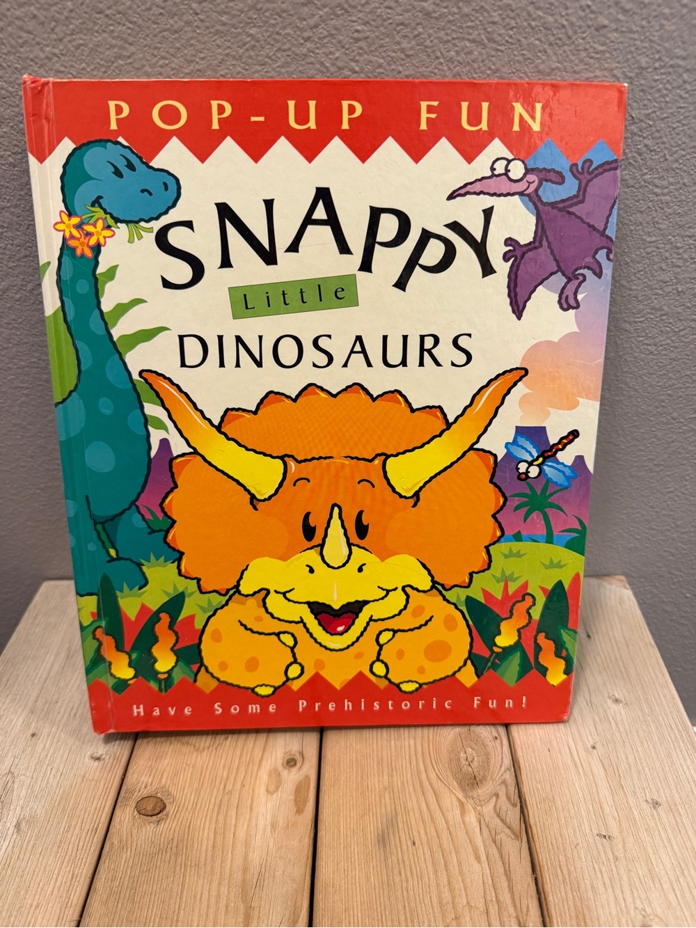 Snappy Little Dinosaurs Pop-Up Fun Book - Orange hardbound